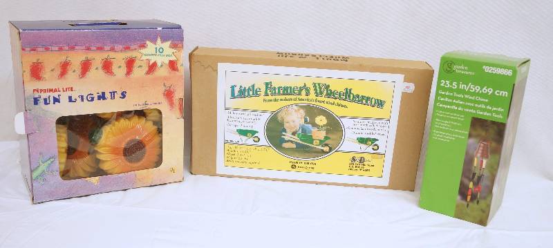 lot 6325 image: JOHN DEERE Little Framers Wheelbarrow - Fun Lights - Garden Chimes