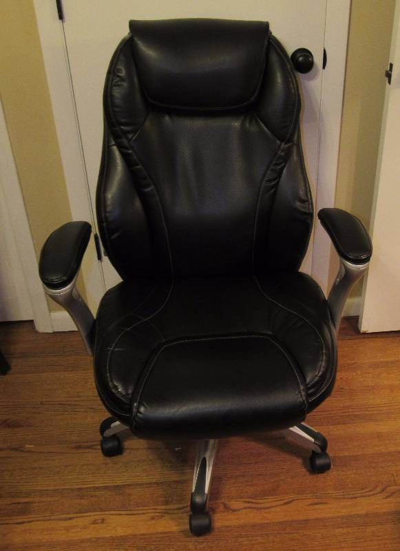 lot 4127 image: Adjustable Office  Desk Chair - Managers Style Black Leather - Rolls Well - Small Tear in Leather on back edge - See photo for details