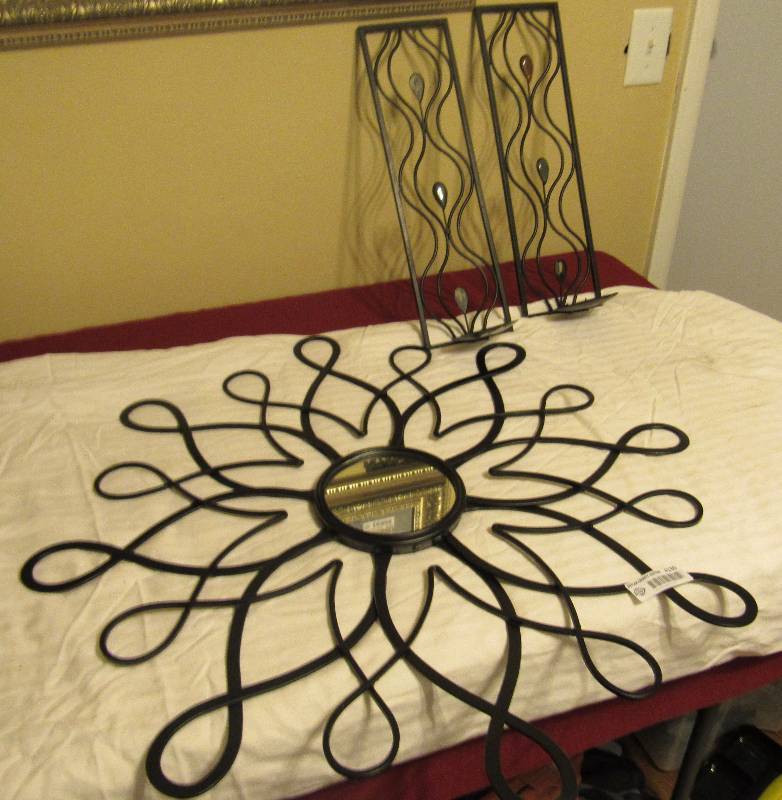 lot 4130 image: Lot of Black Cast Iron Wall Decor - Set of 2 Candle Sconces (hanging) and one mirrored Centerpiece  - Nice