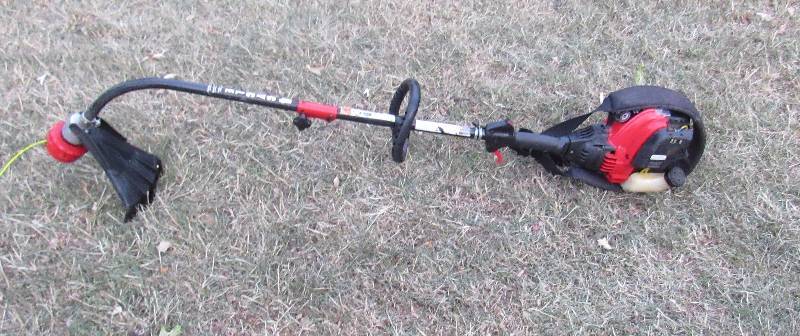 lot 4222 image: Troy-Bilt Gas Powered - Push Start Trimmer - 4 Cycle - Good Working Condition - WORKS