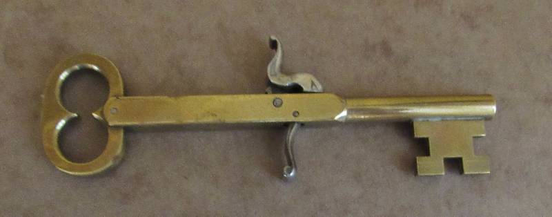 lot 4009 image: Brass Black Powder Pistol Skeleton Key