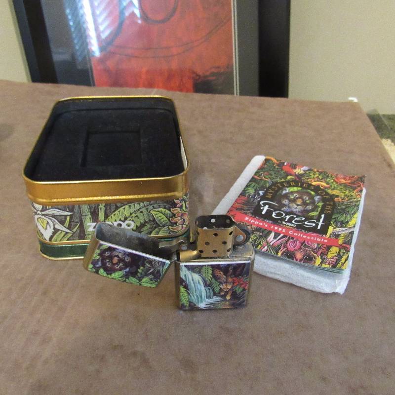 lot 4020 image: Zippo LIghter in Collectors Tin w original papers Mysteries of the Forest - COOL GIFT