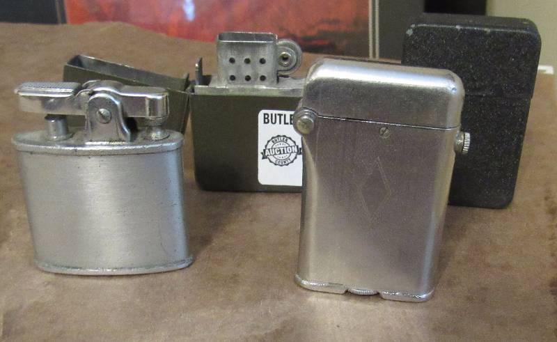 lot 4023 image: Lot of 4 - Vintage Cigarette Lighters - 1 Ronson, 1 Thorens, 2-Zippo-Like