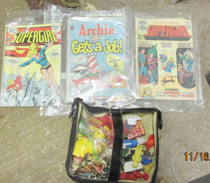 lot 4258 image: Misc. Vintage Toys & Comic Books - Woodstock Toy, 3 DC Comic Books, 2 Supergirl, 1 Archie Gets a Job