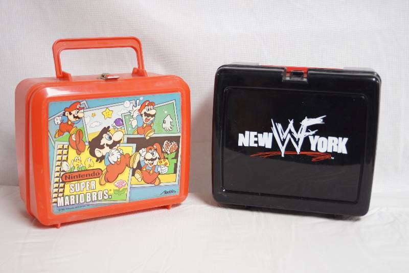 lot 2129 image: Set of 2 Lunch Box- Red Nintendo Super Mario Brothers- Black WWF- Very Cool