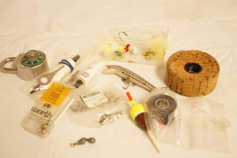 lot 2558 image: Lot of fishing stuff - lures, cork, bobbers, lead, some vintage - plus old padlock - see photos