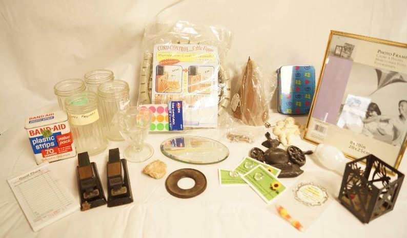 lot 2573 image: Misc Lot of Goodies Novelty items, Staplers, Cord Organizer, Frame and more See photos