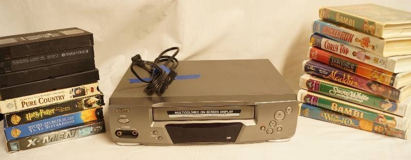 lot 2575 image: VHS Player w movies - DISNEY, Harry Potter and More See photos