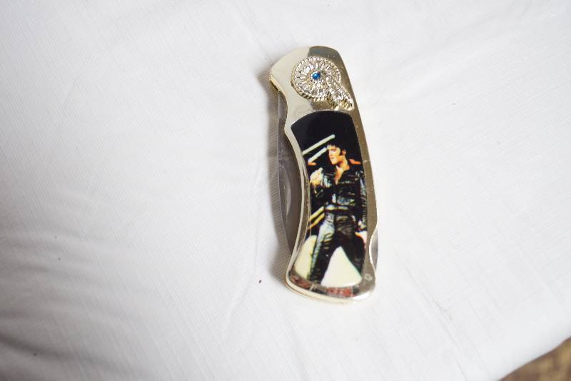 lot 2045 image: Unique Collectable Elvis Presley Silver and Gold Pocket Knife- Very Neat