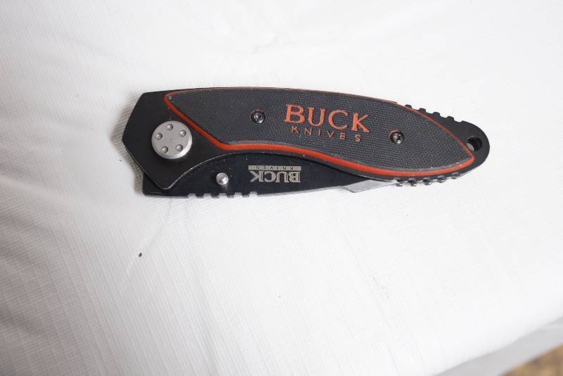 lot 2046 image: Buck Knives Black Pocket Knife- Very Cool