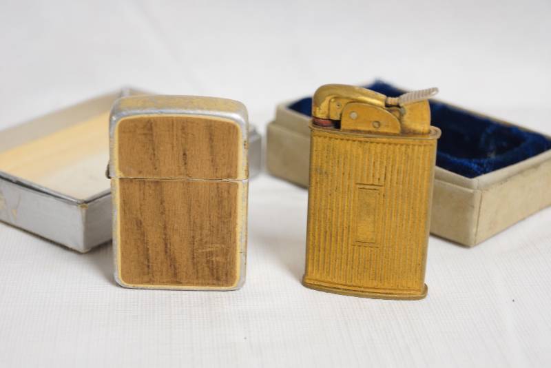 lot 2055 image: Set of 2 Lighters- One Marked Storm King- Very Cool