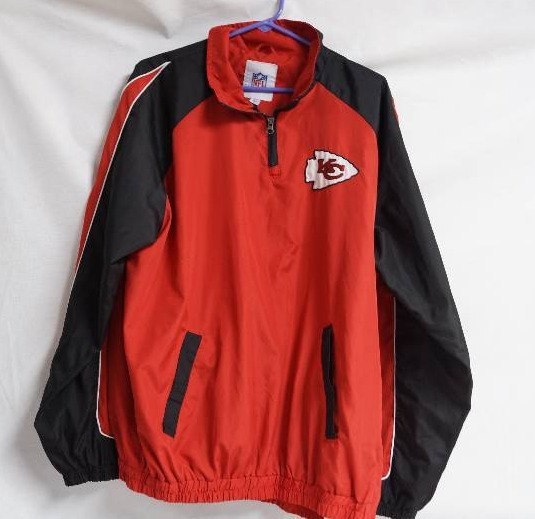 lot 2067 image: Kansas City Chiefs Warm Up Pullover Jacket - NFL Licensed Nice Jacket Size Large - will need washed