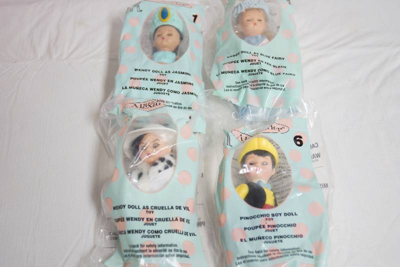 lot 2072 image: Lot of 4 Madame Alexander Dolls - Mc Donalds Happy Meal - Cruella DeVille, Jasmine, Blue Fairy & Pinocchio - DISNEY