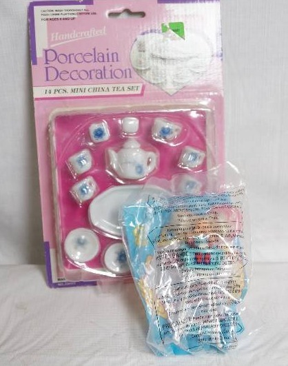lot 2109 image: Assortment of Toys- Glass Mini Teacup Set and Mini Barbie Kelly Doll- Very Cute