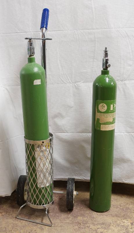 lot 2187 image: Lot of 2 Oxygen Tanks and a Tank Dolly - wrench included - see photos