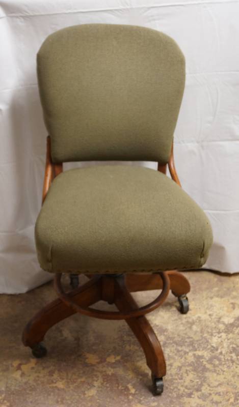 lot 2190 image: Vintage Office Chair - HEAVY - rolls, spins, cool upholstery and tacks - great deco piece