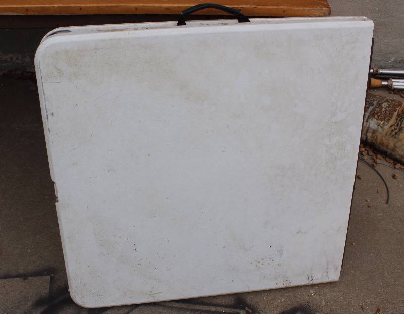 lot 2598 image: Bi-Fold Portable Table w Carry Handle - 60 x 29.5