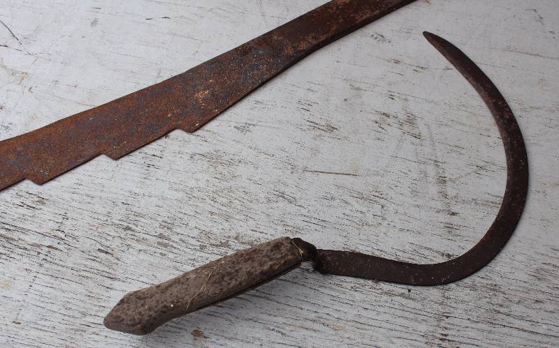 using a vintage hay knife 