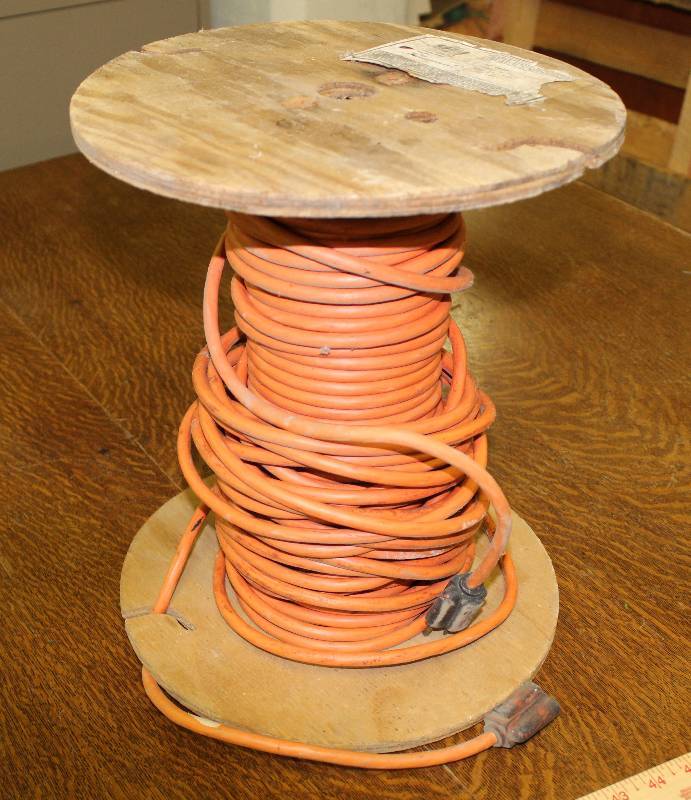 lot 3100 image: Orange Extension Cord - On Spool - Probably 100 feet