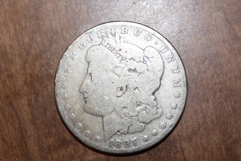 lot 3121 image: 1897-O Morgan Silver Dollar