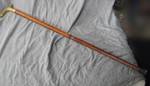 Cane w/ removable brass handle - has a crack in the middle where is unscrews to come apart)