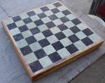 Chess Set - Complete w/ Pieces that store inside the board - some damage on the case - see photos