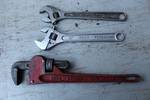 Pipe Wrench and 2 Adjustable Wrenches