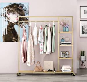 lot 12378 image: $$$ $190 Smlttel Gold Clothing Rack with Shelf,Boutiques Retail Display Gold Clothes Rack,Heavy Duty Garment Rack,Multiple Uses Hanging Rack for Home and Retail(Gold) $$$