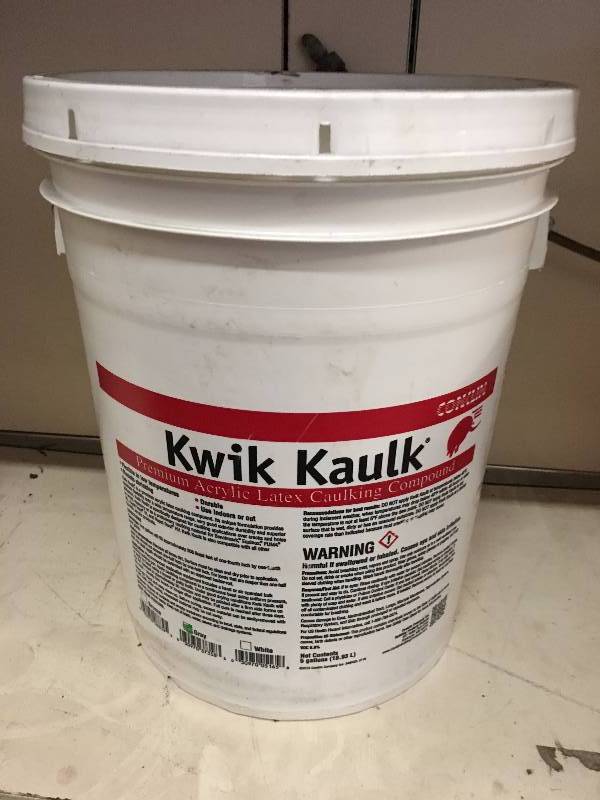 lot 118 image: KWIK KAULK ACRYLIC LATEX CALKING COMPOUND