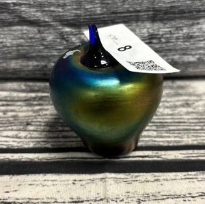 lot 8 image: Blue iridescent, apple paperweight