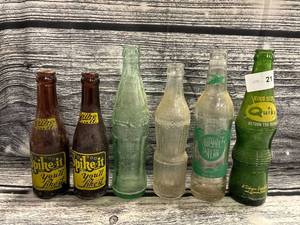 lot 21 image: 6- vintage soda bottles, spike it, Coca-Cola, squeeze, royal Palm, quiky