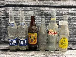 lot 22 image: 6- vintage soda bottles, Mission, works, frostie, vernors