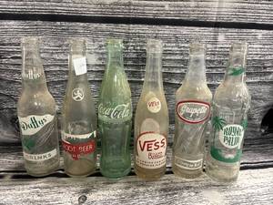 lot 26 image: 6- vintage soda bottles, root beer, Vess, Duffys, Coca-Cola, grapette, royal Palm