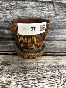 lot 37 image: Vintage McCoy Brown ceramic planter, chip mark, and bottom