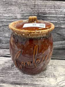 lot 95 image: Vintage Hull brown glazed cookie jar
