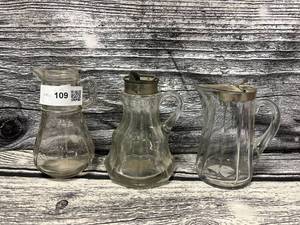 lot 109 image: 3-vintage glass syrup pictures