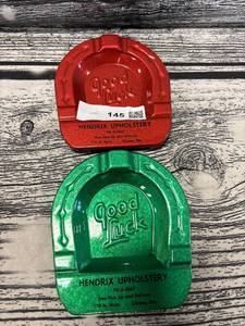 lot 145 image: Vintage Clinton, Missouri, red and green horseshoe ashtrays