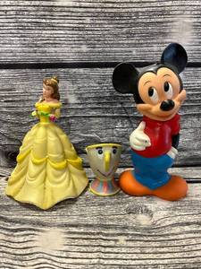 lot 151 image: Beauty and the beast Belle coin bank and chip squeak toy, with Mickey Mouse rubber coin bank