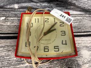lot 241 image: Vintage, red plastic general electric clock, needs work