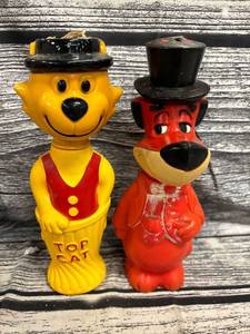 lot 242 image: Vintage Hanna barbara Coin bank, and top cat soaky bath bubble bottle
