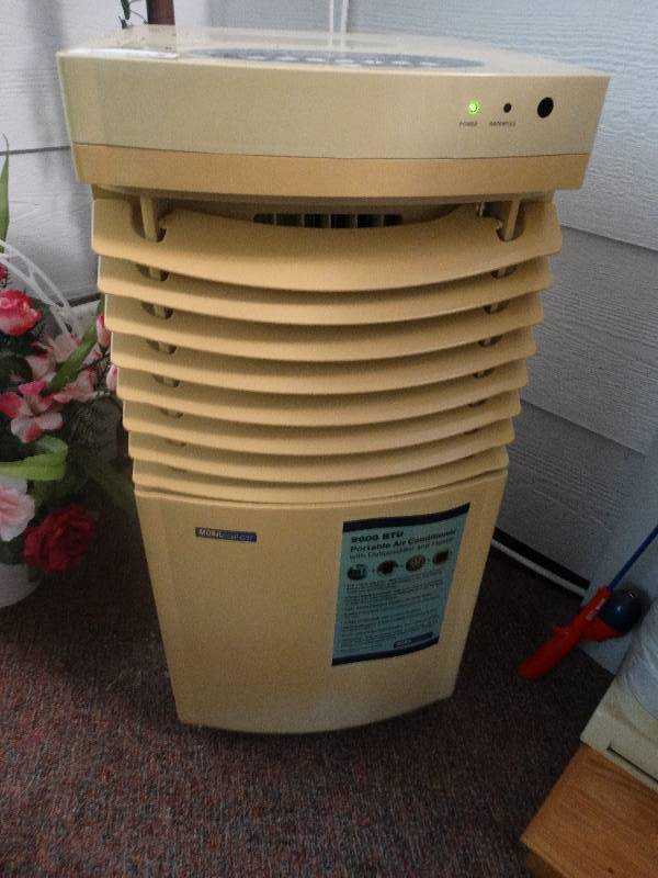 lot 602 image: Portable air conditioner. 9000 BTU