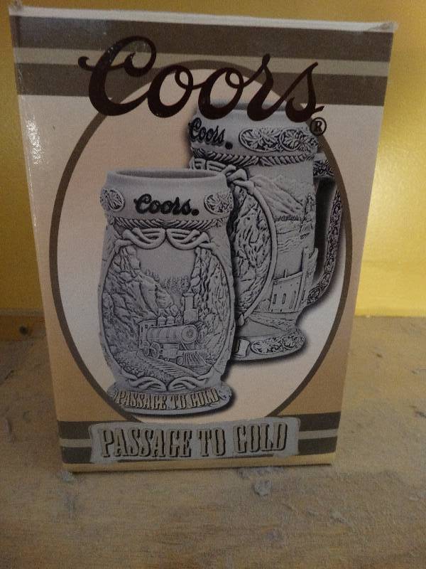 lot 670 image: Coors Passage to Gold beer stein in box