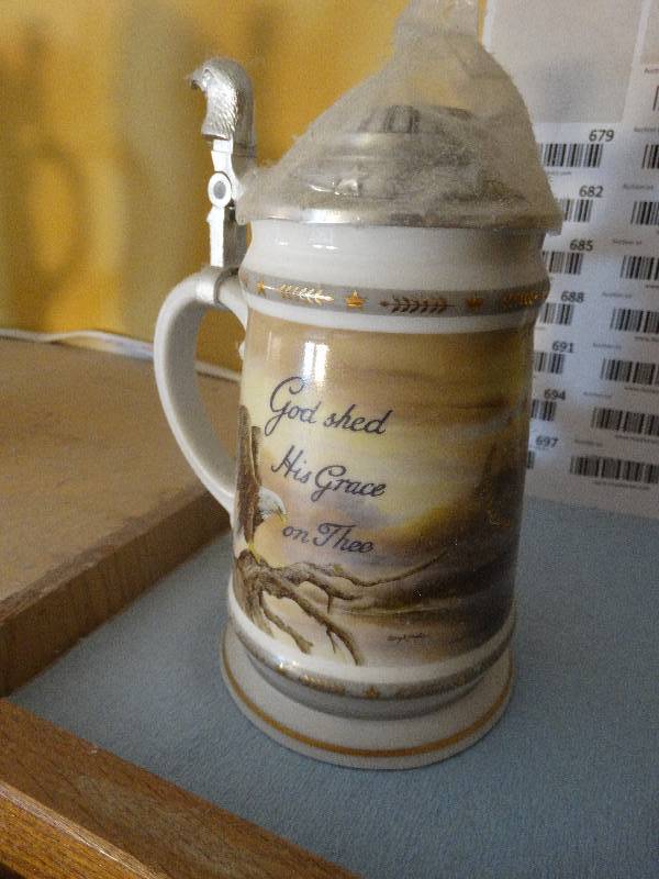 lot 677 image: America the Beautiful series- Gods Grace beer stein