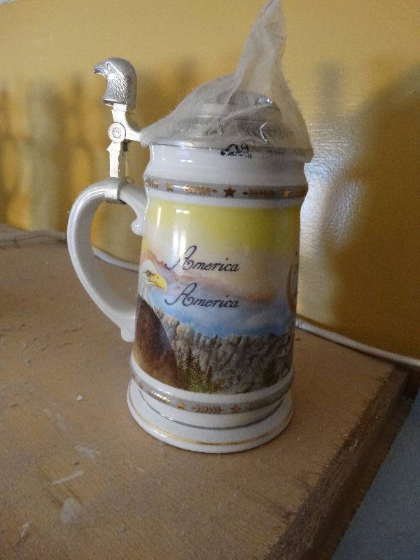 lot 676 image: America the Beautiful series- America America beer stein