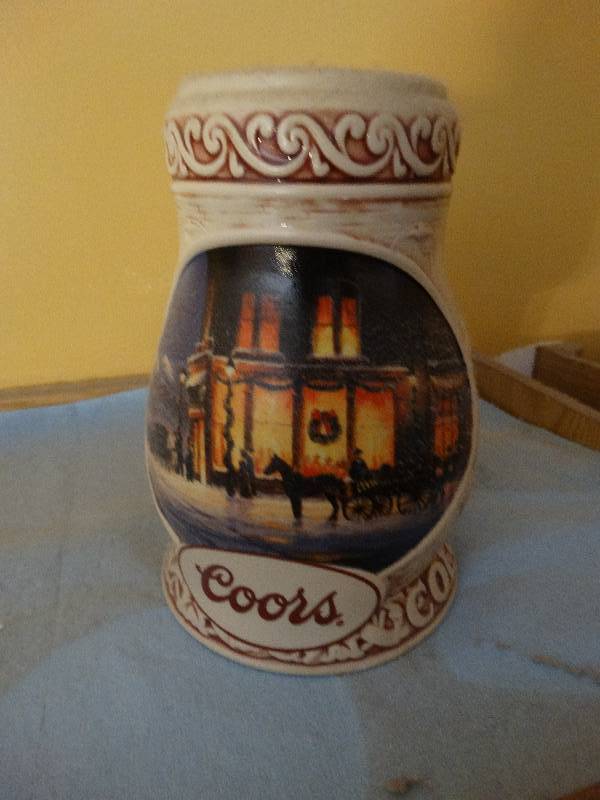 lot 692 image: Coors 1998 Holiday beer stein