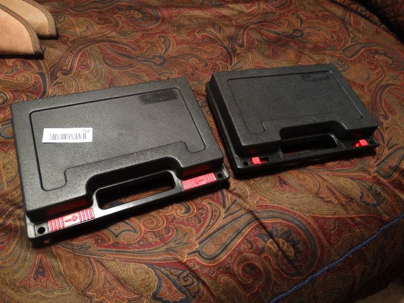 lot 754 image: 2 plastic padded hand gun cases.