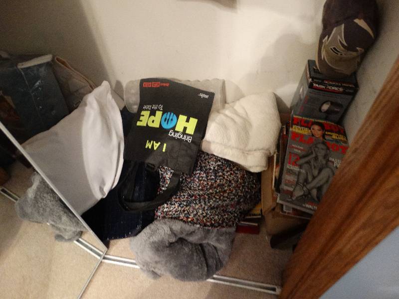 lot 769 image: Contents of Closet - Lot of Playboy Magazines, Linens, misc.