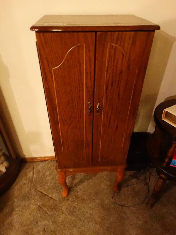 lot 823 image: Jewelry Armoire w Contents - Candles, Tacks, & misc.