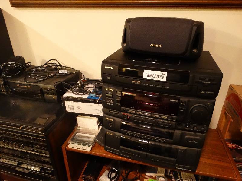lot 840 image: Stereo Cabinet w Stereo, Speakers (4), other electronics