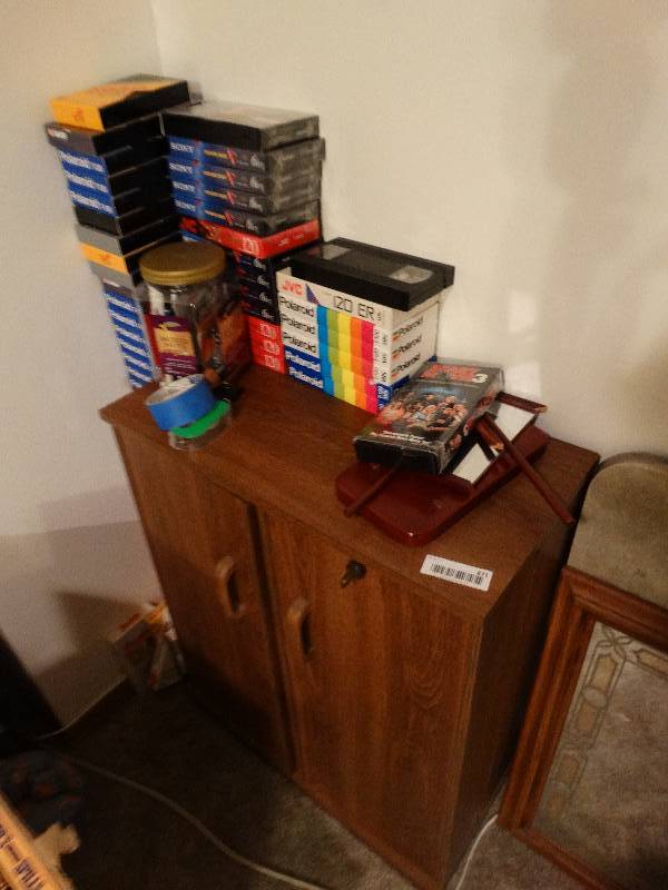 lot 871 image: Media Cabinet w VHS tapes